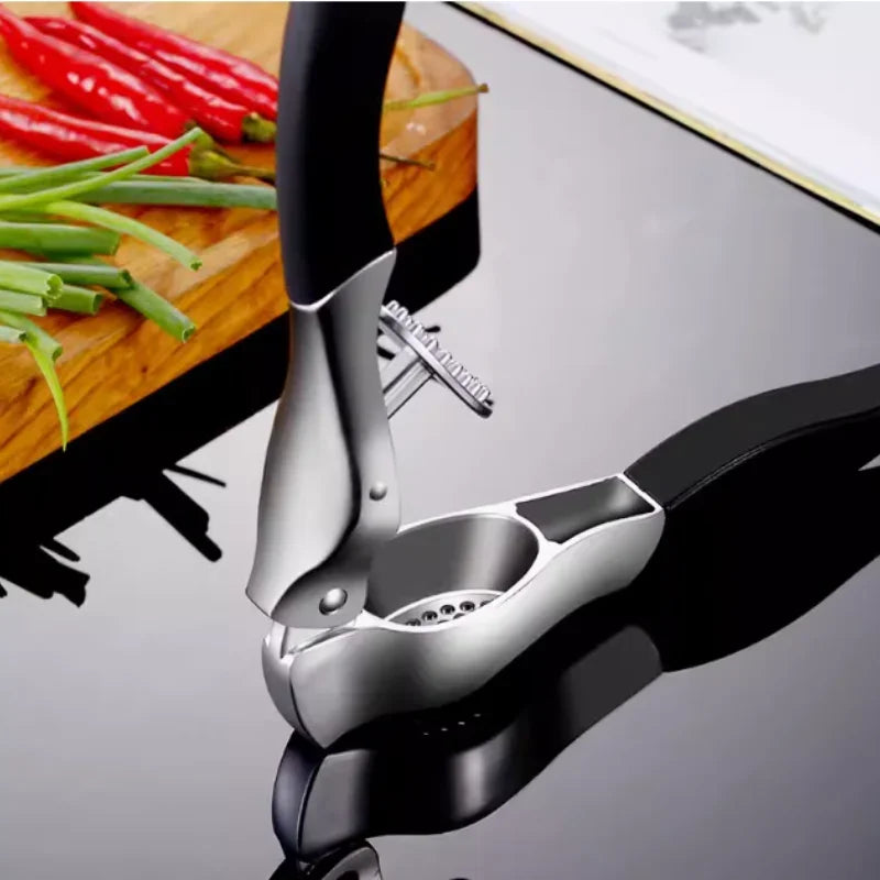 presse ail inox avec éplucheur intégré