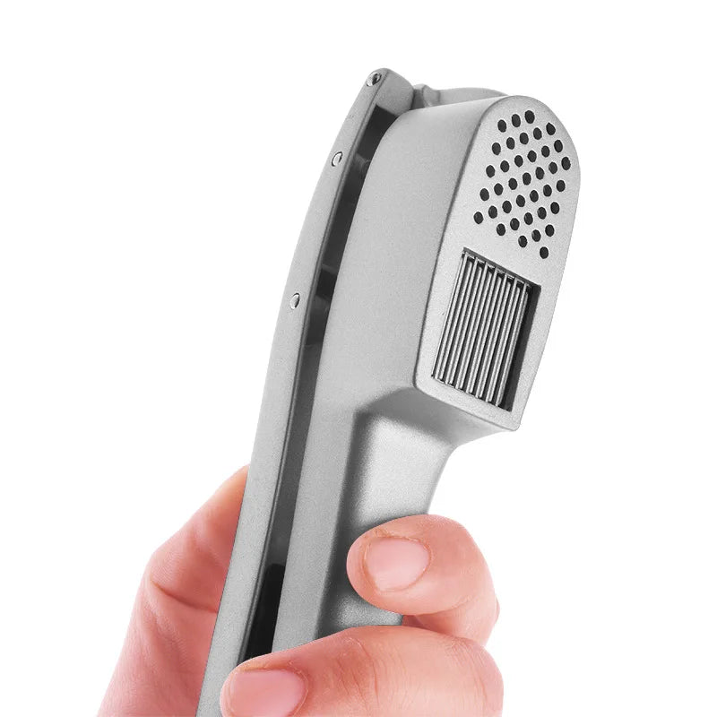 presse ail ergonomique avec éplucheur