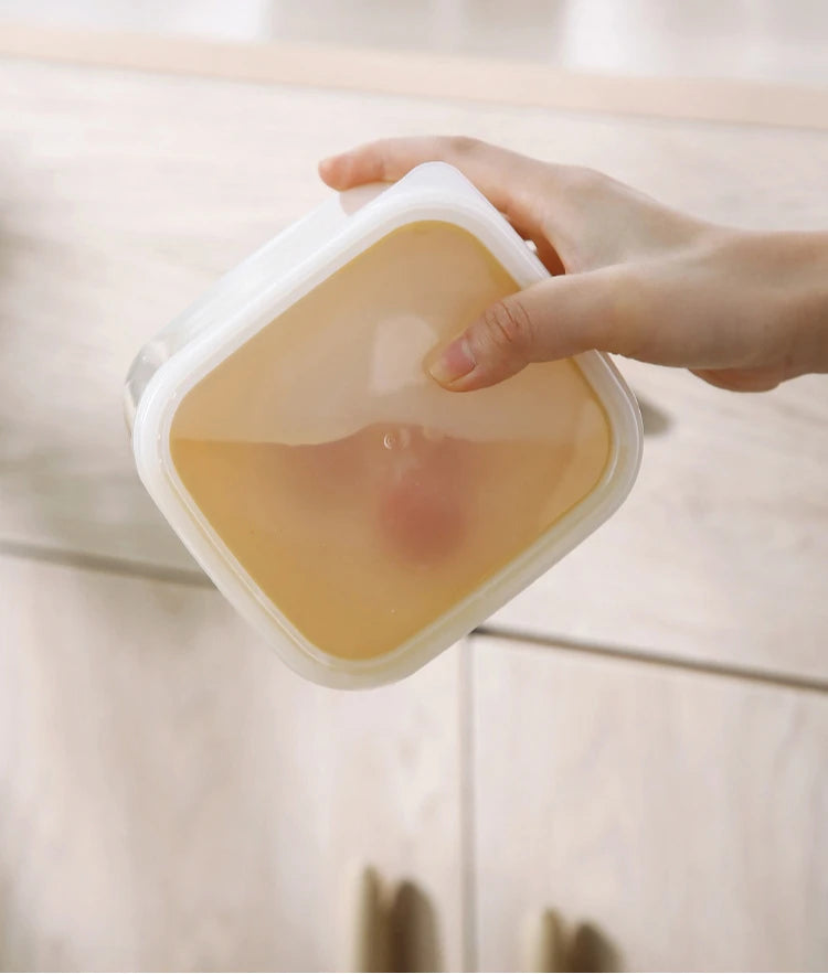 boîte de conservation avec grille pour égoutter les légumes