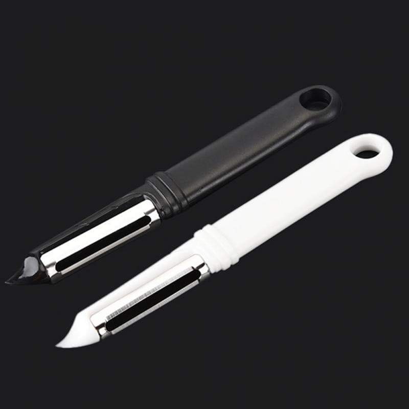 Économe à lame dentelée pivotante