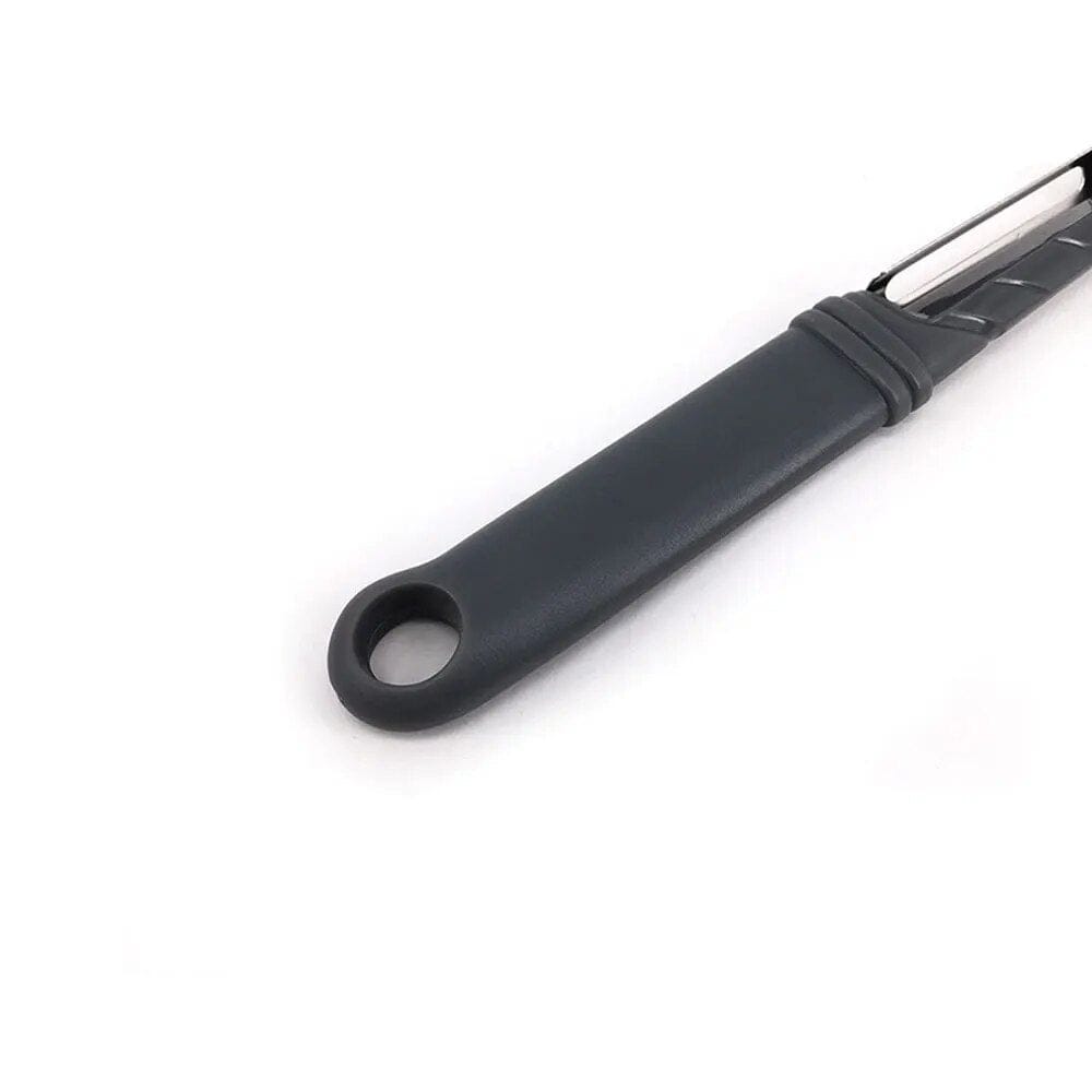 Économe à lame dentelée pivotante