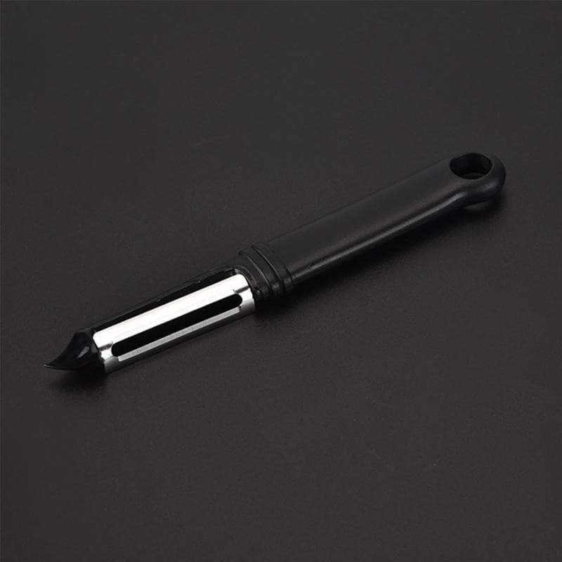 Économe à lame dentelée pivotante