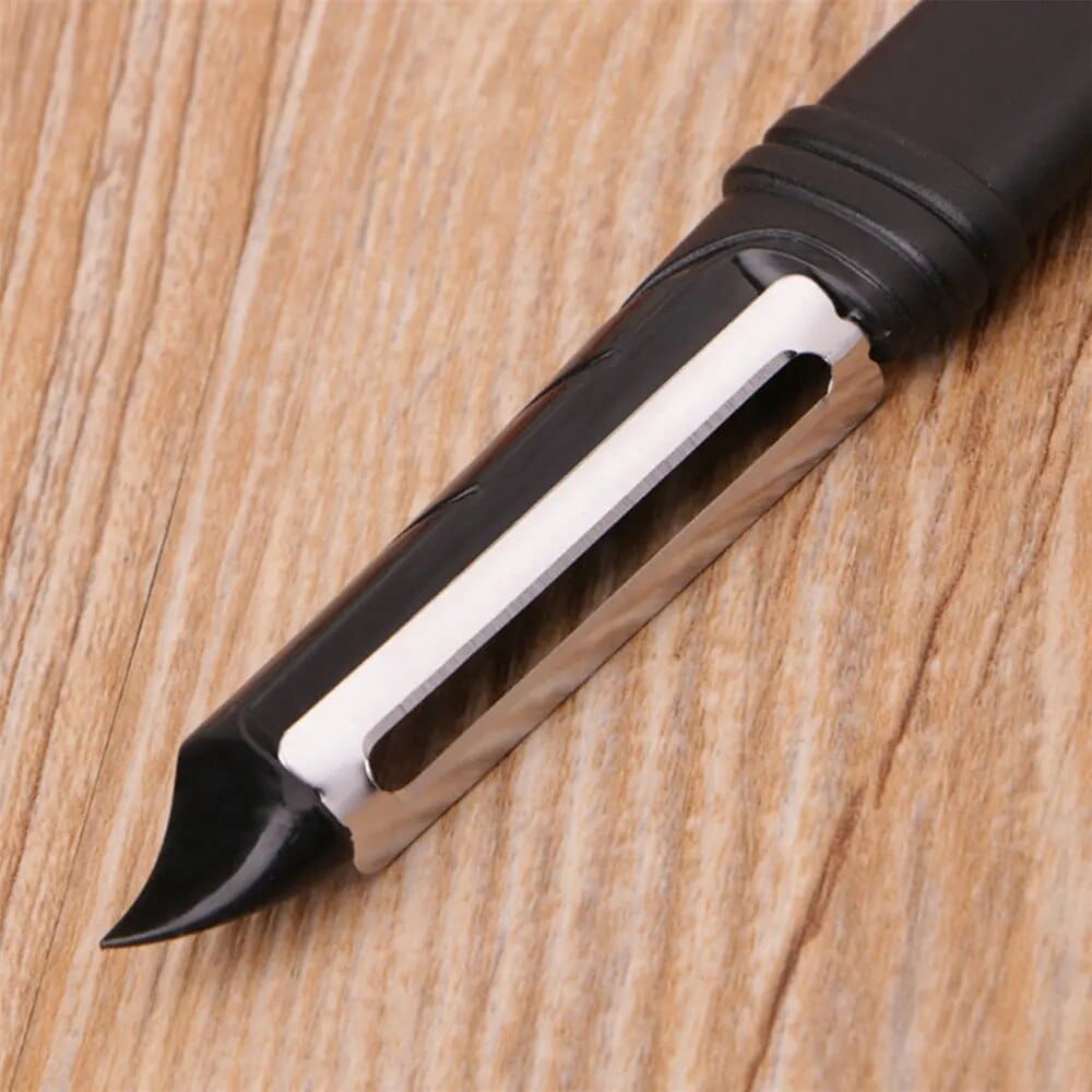 Économe à lame dentelée pivotante