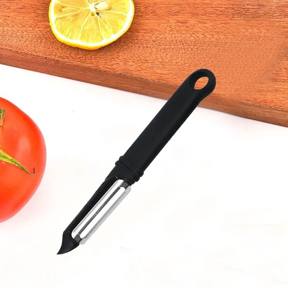 Économe à lame dentelée pivotante