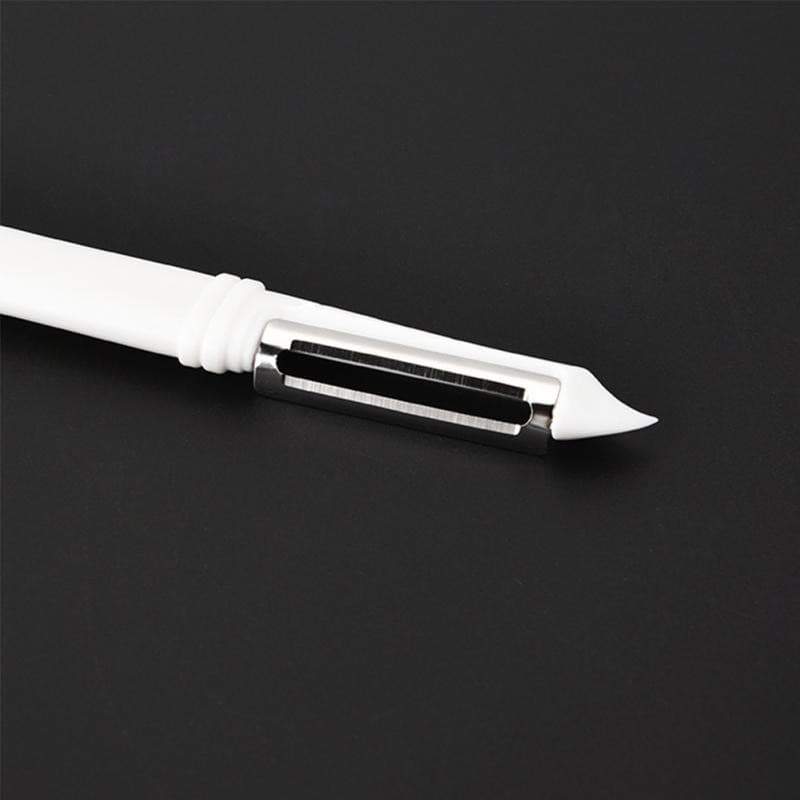 Économe à lame dentelée pivotante