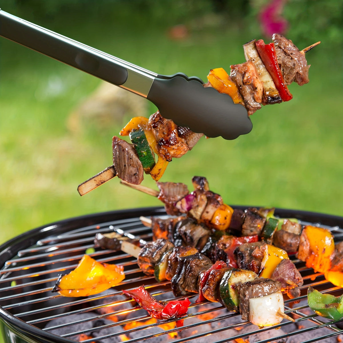 Tong de cuisine en acier inoxydable avec embouts en silicone noirs