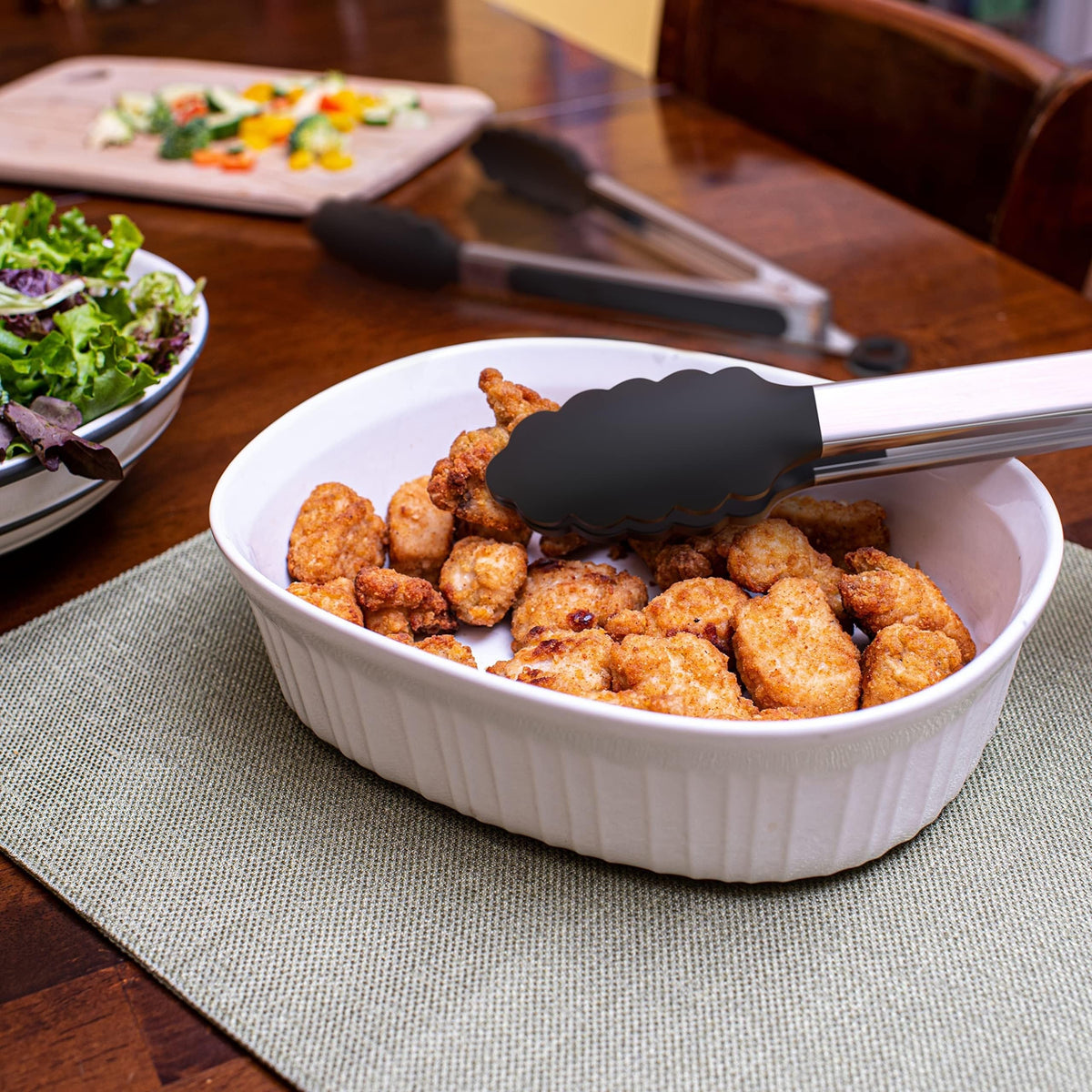 Tong de cuisine en acier inoxydable avec embouts en silicone noirs